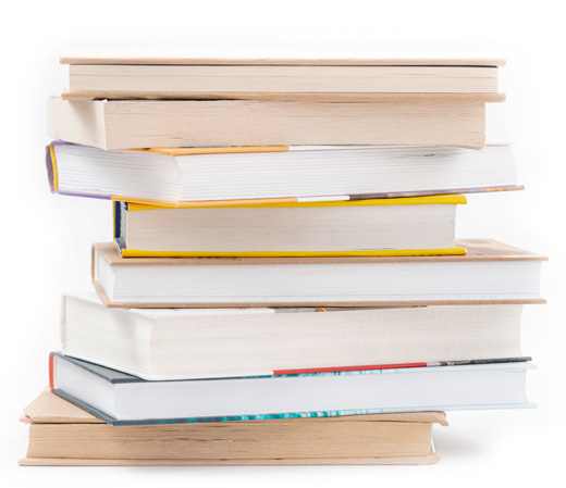 high stacked of knowledge books portraying the story of our wisdom